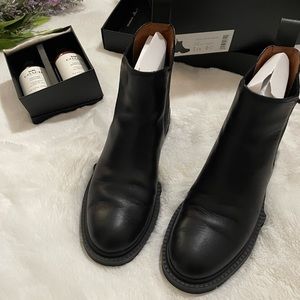 Coach black leather lug sole ankle boot. Size 6.5